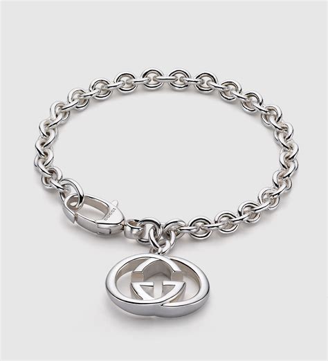 gucci interlocking g charm bracelet|Gucci interlocking g bracelet 18k.